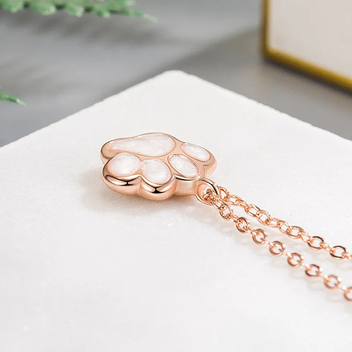 Yanika - Necklace with silver paw pendant